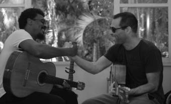 Seu Jorge and Rogê sing about their friendship on their first collaborative album