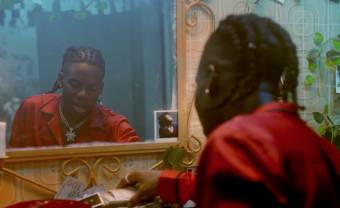 Rema finds his inner lover on “Woman” music video